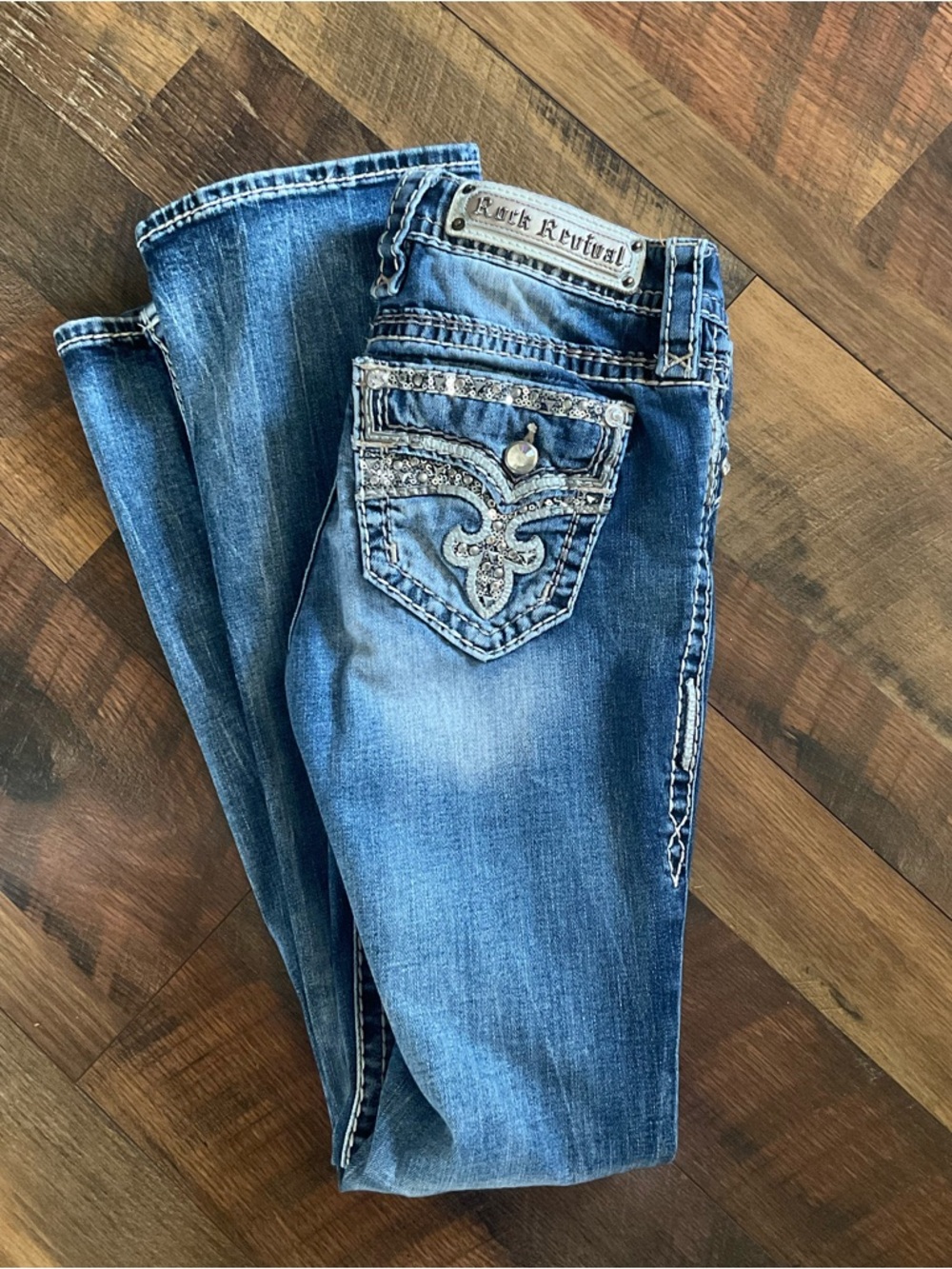 Rock Revival Women's Blue Boot Cut Jeans with Embellished Pocket